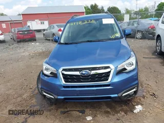 2017 Subaru Forester Touring with VIN JF2SJAWC7HH455648, listed as a IAAI auction lot 42118358 with 58,123 mi miles and . Bid and sale history available at DreamBid. Image 13.