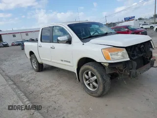2011 Nissan Titan Pro-4X z VIN 1N6BA0EC8BN307959, wystawiony jako IAAI lot #41837097 z przebiegiem 160 672 mil mil oraz . Historia ofert i sprzedaży dostępna na DreamBid. Obrazek 1.