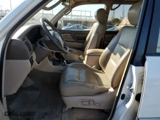 1999 Toyota Land Cruiser with VIN JT3HT05J7X0068239, listed as a Copart auction lot 78456064 with 222,241 mi miles and Salvage Title. Bid and sale history available at carsss.com. Image 7.