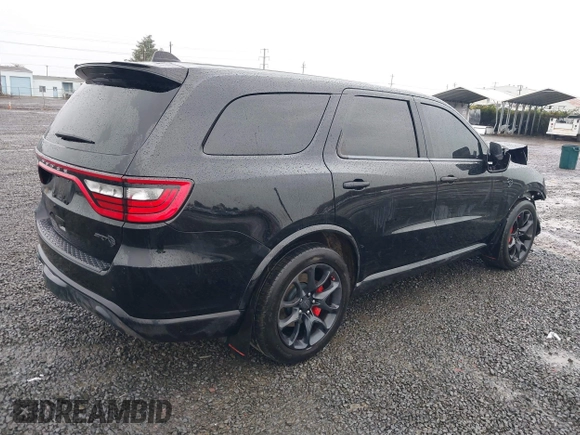 2021 Dodge Durango SRT Hellcat with VIN 1C4SDJH95MC643177, listed as a IAAI auction lot 41007139 with 31,650 mi miles and . Bid and sale history available at DreamBid. Image 4.