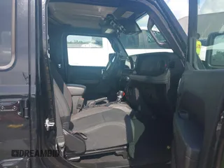 2024 Jeep Wrangler Rubicon with VIN 1C4PJXFG0RW271322, listed as a IAAI auction lot 42736647 with 32,319 mi miles and . Bid and sale history available at DreamBid. Image 5.