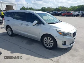 2018 Kia Sedona EX with VIN KNDMC5C12J6345930, listed as a IAAI auction lot 42008064 with 214,465 mi miles and . Bid and sale history available at carsss.com. Image 1.