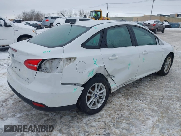 2017 Ford Focus SE with VIN 1FADP3F20HL235067, listed as a IAAI auction lot 41580300 with 79,009 mi miles and . Bid and sale history available at DreamBid. Image 4.