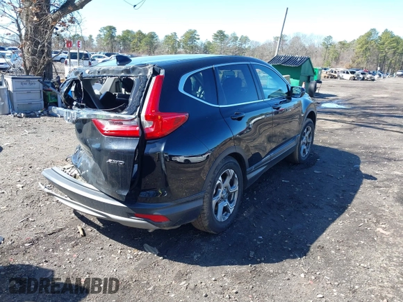 2019 Honda CR-V EX with VIN 2HKRW2H5XKH674504, listed as a IAAI auction lot 41823838 with 104,281 mi miles. Bid and sale history available at carsss.com. Image 3.