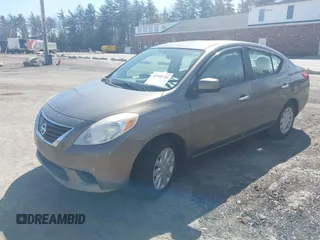 2012 Nissan Versa SV with VIN 3N1CN7AP8CL889109, listed as a IAAI auction lot 42018726 with 123,077 mi miles. Bid and sale history available at carsss.com. Image 2.