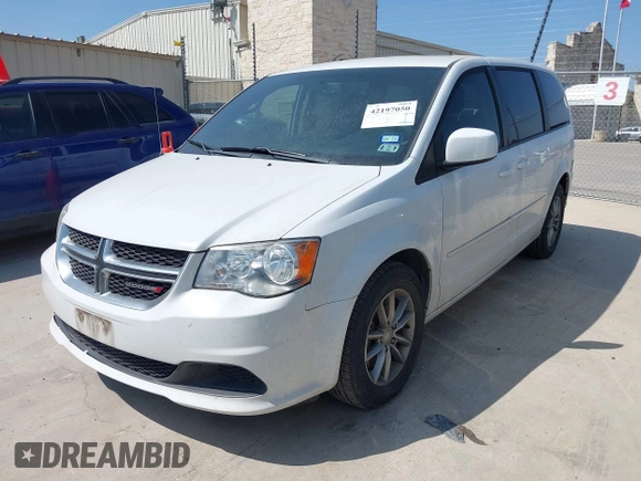 2015 Dodge Grand Caravan SE with VIN 2C4RDGBG9FR691462, listed as a IAAI auction lot 42197050 with 124,239 mi miles and . Bid and sale history available at DreamBid. Image 2.