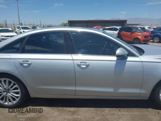 2013 Audi A6 Premium Plus with VIN WAUDFAFC0DN010430, listed as a IAAI auction lot 42603497 with 101,980 mi miles and . Bid and sale history available at DreamBid. Image 13.