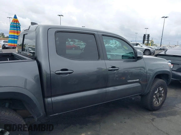 2017 Toyota Tacoma SR5 z VIN 3TMAZ5CN7HM045752, wystawiony jako IAAI lot #42057874 z przebiegiem 89 898 mil mil oraz . Historia ofert i sprzedaży dostępna na DreamBid. Obrazek 13.