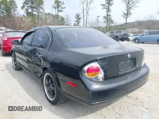 2002 Nissan Maxima GLE z VIN JN1DA31D42T411097, wystawiony jako IAAI lot #41667218 z przebiegiem 213 560 mil mil oraz . Historia ofert i sprzedaży dostępna na DreamBid. Obrazek 3.