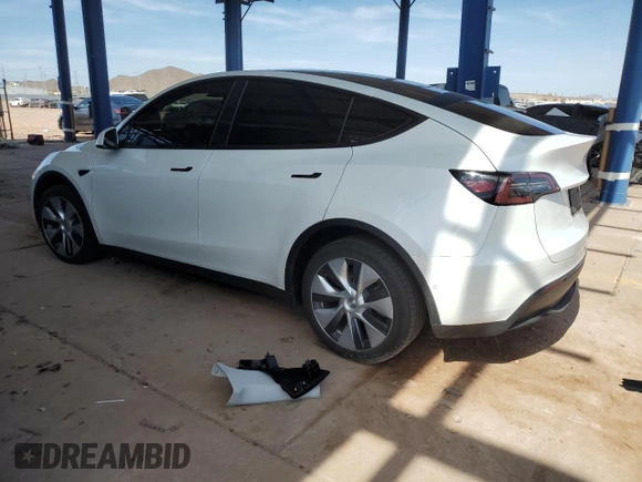 2022 Tesla Model Y Long Range z VIN 7SAYGDEE5NA015841, wystawiony jako Copart lot #57842275 z przebiegiem 51 952 mil mil oraz Szkody całkowita. Historia ofert i sprzedaży dostępna na DreamBid. Obrazek 2.