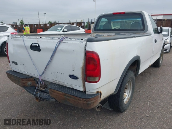 1998 Ford F-150 with VIN 1FTZF1820WKA25768, listed as a IAAI auction lot 42574710 with 206,902 mi miles and . Bid and sale history available at DreamBid. Image 4.