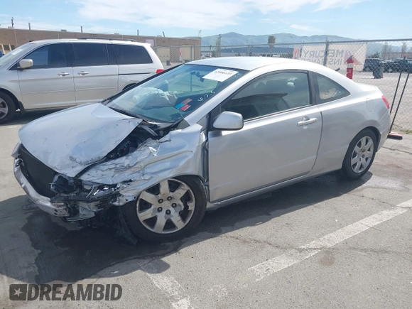 2010 Honda Civic Cpe LX with VIN 2HGFG1B64AH519662, listed as a IAAI auction lot 42006635 with 84,119 mi miles. Bid and sale history available at carsss.com. Image 2.