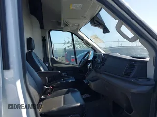 2022 Ford Transit Cargo z VIN 1FTBW3X83NKA36099, wystawiony jako IAAI lot #41966836 z przebiegiem 116 881 mil mil oraz . Historia ofert i sprzedaży dostępna na DreamBid. Obrazek 5.