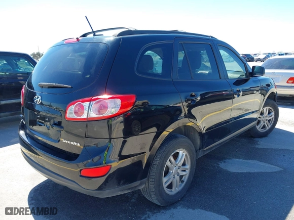 2010 Hyundai Santa Fe GLS with VIN 5NMSG3AB5AH349601, listed as a IAAI auction lot 41703468 with 181,052 mi miles. Bid and sale history available at carsss.com. Image 4.
