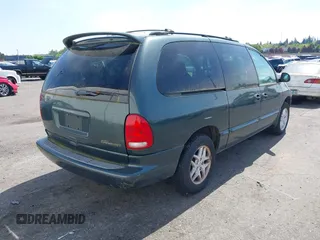 2000 Dodge Grand Caravan with VIN 1B4GT44L4YB583087, listed as a IAAI auction lot 42081647 with Not Provided miles and . Bid and sale history available at DreamBid. Image 4.