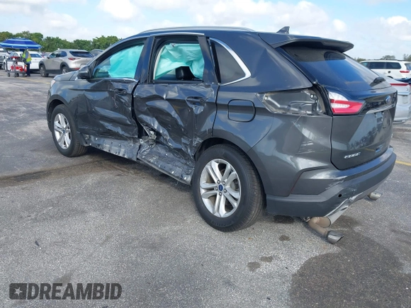 2020 Ford Edge SEL with VIN 2FMPK4J90LBA60985, listed as a IAAI auction lot 41590512 with 141,733 mi miles. Bid and sale history available at carsss.com. Image 3.