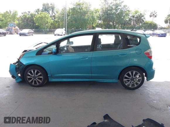 2013 Honda Fit Sport z VIN JHMGE8H54DC026019, wystawiony jako IAAI lot #42125500 z przebiegiem 139 285 mil mil oraz . Historia ofert i sprzedaży dostępna na DreamBid. Obrazek 14.