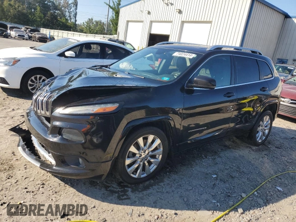 2016 Jeep Cherokee Overland with VIN 1C4PJLJS9GW297855, listed as a Copart auction lot 74024414 with 163,578 mi miles and Salvage title. Bid and sale history available at DreamBid. Image 1.