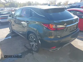 2022 Lexus RX 350 z VIN 2T2HZMDA9NC345426, wystawiony jako IAAI lot #40806565 z przebiegiem 17 592 mil mil oraz . Historia ofert i sprzedaży dostępna na DreamBid. Obrazek 3.