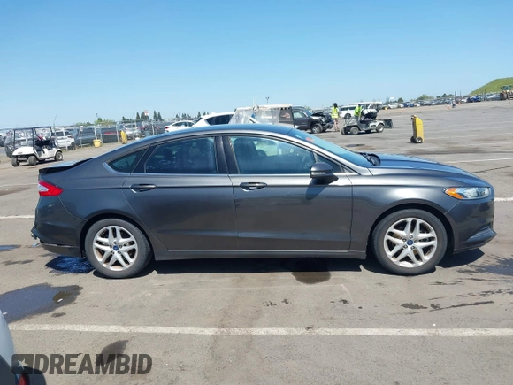 2015 Ford Fusion SE with VIN 3FA6P0H7XFR306483, listed as a IAAI auction lot 42033062 with 159,922 mi miles and . Bid and sale history available at DreamBid. Image 14.