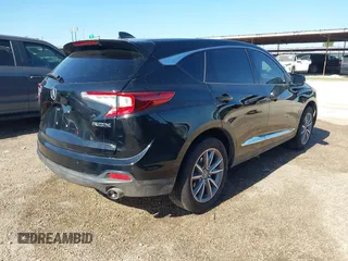 2021 Acura RDX Technology with VIN 5J8TC1H53ML001319, listed as a IAAI auction lot 41972431 with 89,698 mi miles and . Bid and sale history available at DreamBid. Image 4.