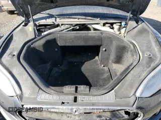 2013 Tesla Model S with VIN 5YJSA1CG9DFP09733, listed as a Copart auction lot 87739005 with 88,163 mi miles and Salvage title. Bid and sale history available at DreamBid. Image 11.