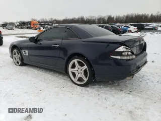 2009 Mercedes-Benz SL 550 with VIN WDBSK71F09F153162, listed as a Copart auction lot 88884365 with 155,973 mi miles and Salvage title. Bid and sale history available at DreamBid. Image 2.