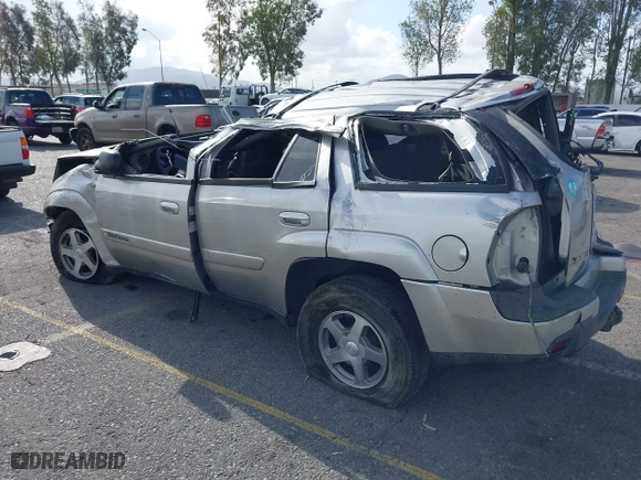2004 Chevrolet TrailBlazer LT with VIN 1GNDS13S442417203, listed as a IAAI auction lot 41858690 with 98,983 mi miles. Bid and sale history available at carsss.com. Image 3.