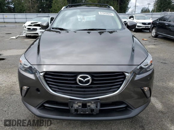2017 Mazda CX-3 Touring with VIN JM1DKFC79H0148103, listed as a Copart auction lot 51343025 with 79,765 mi miles and Salvage Title. Bid and sale history available at DreamBid. Image 5.