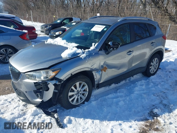 2013 Mazda CX-5 Touring with VIN JM3KE2CE7D0129623, listed as a IAAI auction lot 41344623 with 147,025 mi miles. Bid and sale history available at carsss.com. Image 18.