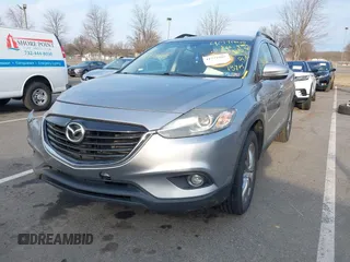 2015 Mazda CX-9 Grand Touring with VIN JM3TB3DA6F0447184, listed as a IAAI auction lot 41771865 with 137,814 mi miles. Bid and sale history available at carsss.com. Image 2.