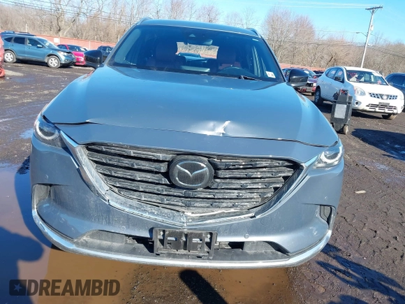 2021 Mazda CX-9 Grand Touring with VIN JM3TCBDY5M0506632, listed as a IAAI auction lot 41589264 with 50,026 mi miles and . Bid and sale history available at carsss.com. Image 12.