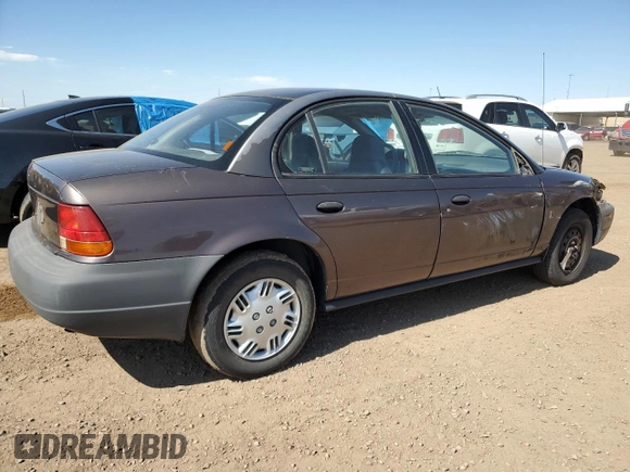 1998 Saturn SL с VIN 1G8ZH528XWZ140961, выставлен на аукционе Copart как лот 61259575 с пробегом 237 291 миль миль и Списание • Salvage title. История ставок и продаж доступна на DreamBid. Изображение 3.
