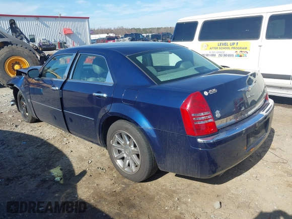 2005 Chrysler 300 with VIN 2C3JA63HX5H654114, listed as a IAAI auction lot 41469161 with 136,104 mi miles. Bid and sale history available at carsss.com. Image 3.