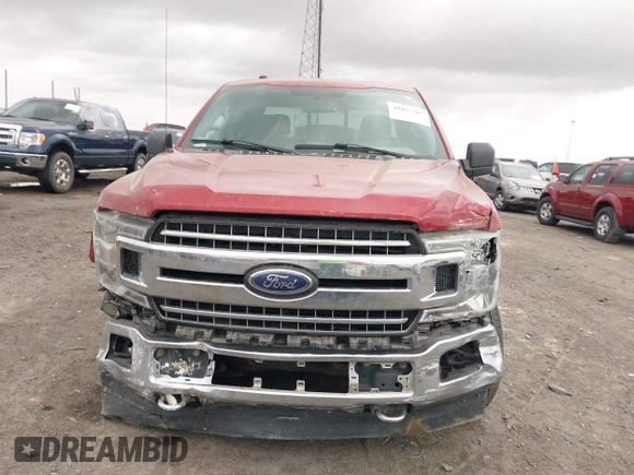 2018 Ford F-150 XL with VIN 1FTFX1E51JKF98962, listed as a IAAI auction lot 41827587 with 128,031 mi miles and . Bid and sale history available at DreamBid. Image 11.