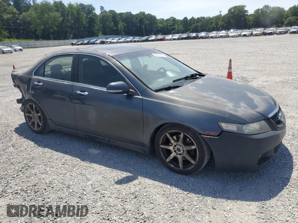2004 Acura TSX w/Navigation with VIN JH4CL95984C027014, listed as a Copart auction lot 61915155 with 215,007 mi miles and Salvage title. Bid and sale history available at DreamBid. Image 4.