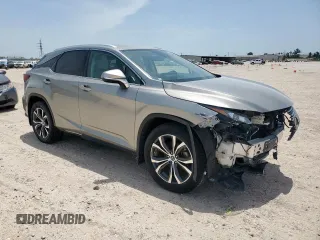 2022 Lexus RX 350 with VIN 2T2HZMDA2NC329679, listed as a Copart auction lot 57273415 with 36,914 mi miles and Salvage Title. Bid and sale history available at DreamBid. Image 4.