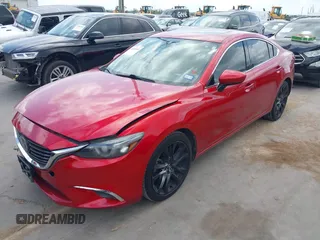 2016 Mazda 6 i Grand Touring z VIN JM1GJ1W58G1486694, wystawiony jako IAAI lot #42094443 z przebiegiem 77 803 mil mil oraz . Historia ofert i sprzedaży dostępna na DreamBid. Obrazek 17.