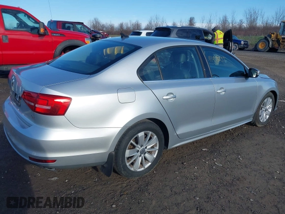 2015 Volkswagen Jetta Sedan 1.8T SE with VIN 3VWD17AJ3FM303470, listed as a IAAI auction lot 41973255 with 90,583 mi miles. Bid and sale history available at carsss.com. Image 4.