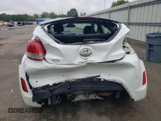 2013 Hyundai Veloster w/Gray Int с VIN KMHTC6AD3DU164555, выставлен на аукционе Copart как лот 54487605 с пробегом 146 134 миль миль и Списание • Salvage title. История ставок и продаж доступна на DreamBid. Изображение 6.