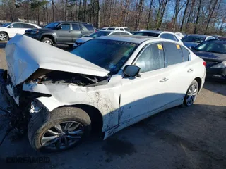 2014 Infiniti Q50 with VIN JN1BV7AP5EM670919, listed as a IAAI auction lot 41335381 with 1 mi miles. Bid and sale history available at carsss.com. Image 2.