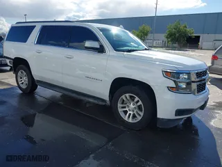 2016 Chevrolet Suburban LT with VIN 1GNSKHKC3GR248524, listed as a IAAI auction lot 41537074 with 117,712 mi miles. Bid and sale history available at carsss.com. Image 1.