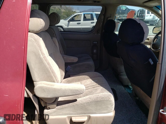2000 Toyota Sienna LE z VIN 4T3ZF13C5YU247698, wystawiony jako Copart lot #53968755 z przebiegiem Nie podano mil oraz Szkoda całkowita • Salvage title. Historia ofert i sprzedaży dostępna na DreamBid. Obrazek 11.