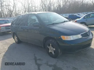 1999 Honda Odyssey EX z VIN 2HKRL1868XH528671, wystawiony jako IAAI lot #41770039 z przebiegiem 247 028 mil mil oraz . Historia ofert i sprzedaży dostępna na DreamBid. Obrazek 1.