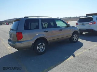 2003 Honda Pilot EX with VIN 2HKYF18513H547292, listed as a IAAI auction lot 41744101 with 236,852 mi miles. Bid and sale history available at carsss.com. Image 4.