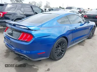 2018 Ford Mustang GT z VIN 1FA6P8CF2J5127010, wystawiony jako IAAI lot #42077900 z przebiegiem 77 023 mil mil oraz . Historia ofert i sprzedaży dostępna na DreamBid. Obrazek 4.