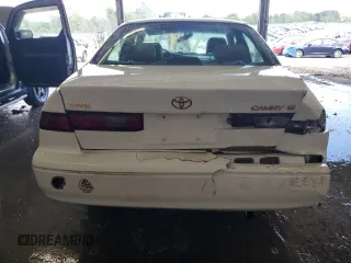 1999 Toyota Camry LE z VIN JT2BG22K3X0317823, wystawiony jako Copart lot #58203965 z przebiegiem 167 587 mil mil oraz Szkoda całkowita • Salvage title. Historia ofert i sprzedaży dostępna na DreamBid. Obrazek 6.