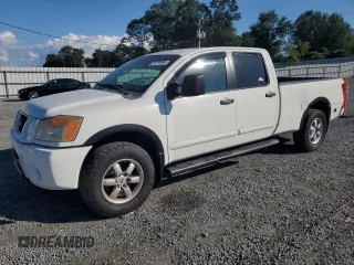 2008 Nissan Titan z VIN 1N6BA07F58N305750, wystawiony jako Copart lot #72731584 z przebiegiem 165 081 mil mil oraz Tytuł czysty. Historia ofert i sprzedaży dostępna na DreamBid. Obrazek 1.