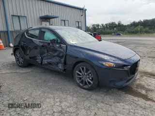 2023 Mazda 3 S Select with VIN JM1BPAKM2P1618984, listed as a Copart auction lot 63008105 with 36,781 mi miles and Salvage title. Bid and sale history available at DreamBid. Image 4.