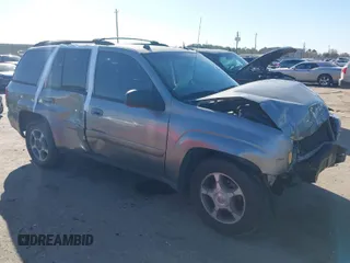 2005 Chevrolet TrailBlazer LS with VIN 1GNDS13S752150026, listed as a IAAI auction lot 41721359 with 180,154 mi miles and . Bid and sale history available at DreamBid. Image 1.